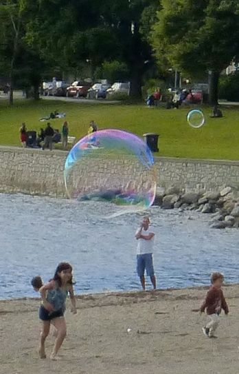 Rainbow bubble on the beach